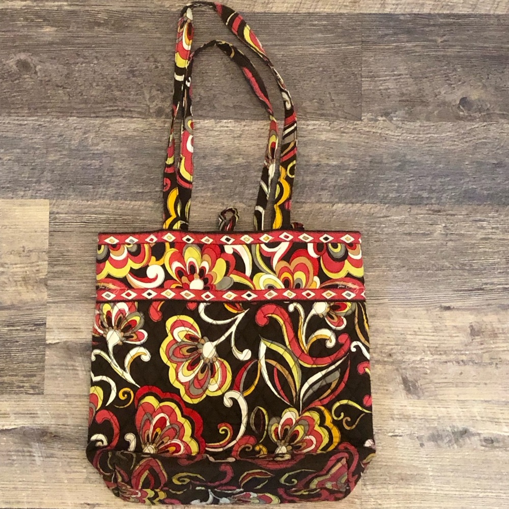 Puccini tote with another Vera Bradley tote that’s free missing closure